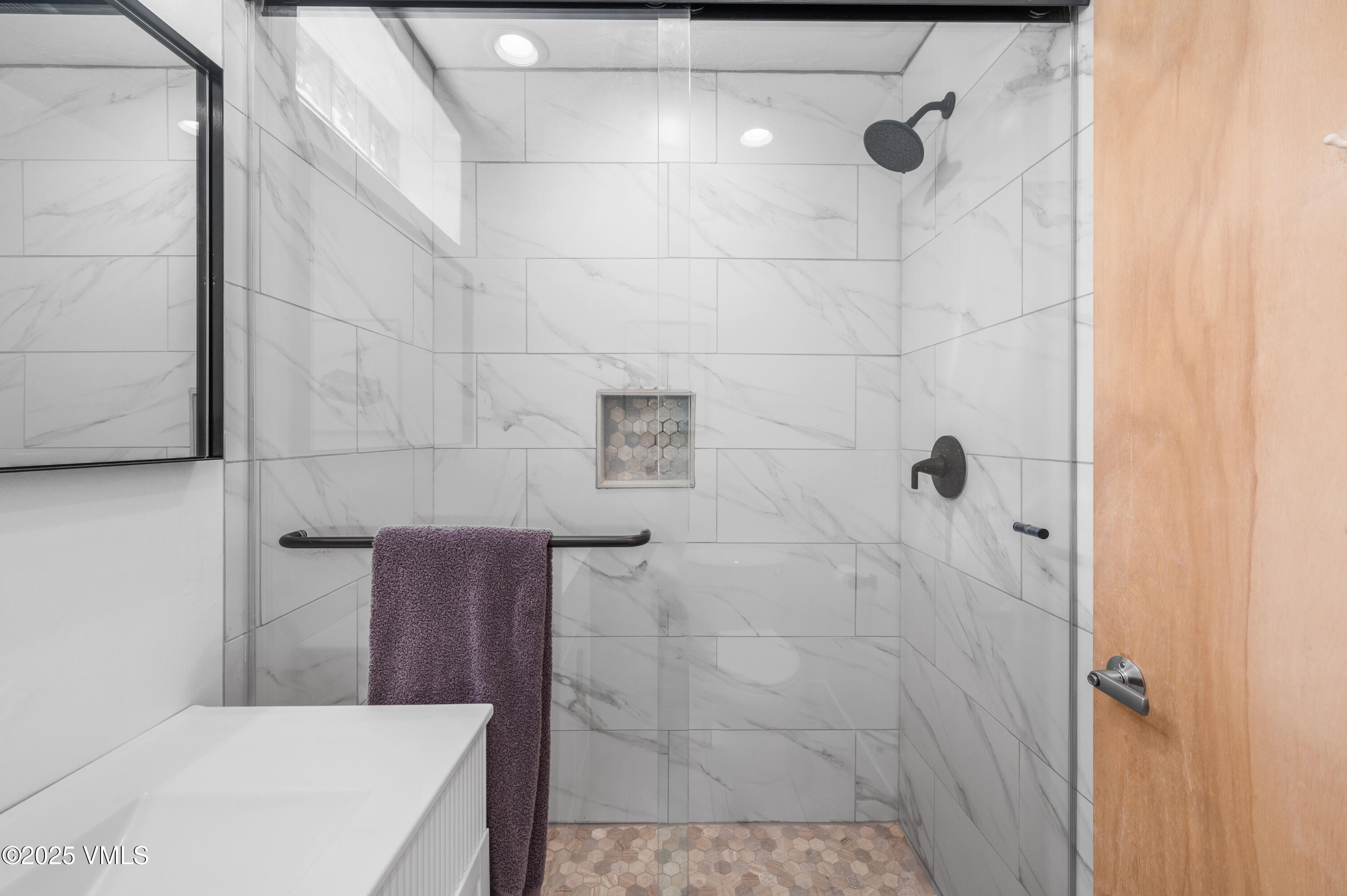 2349 Chamonix Lane Vail, CO 81657 - Photo 24 of 43 a bathroom with a shower