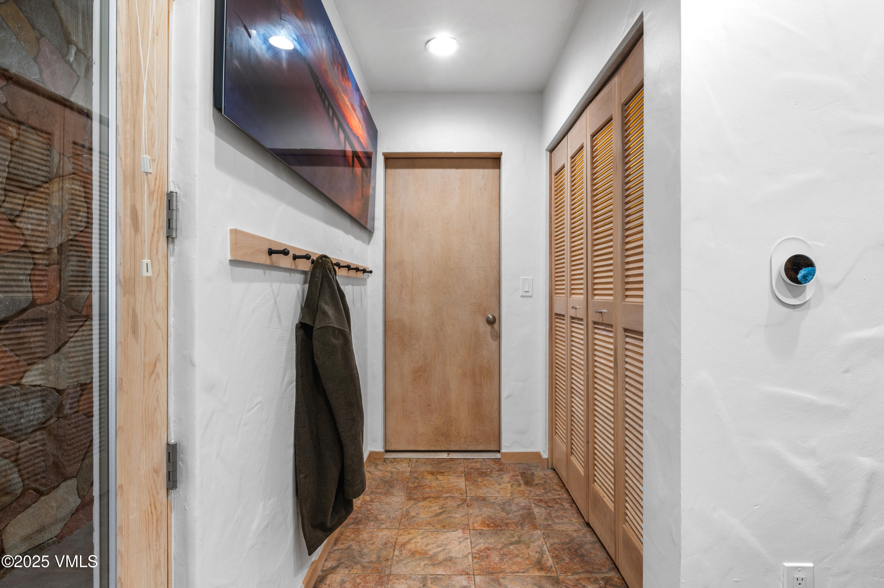 2349 Chamonix Lane Vail, CO 81657 - Photo 33 of 43 a view of hallway with stairs