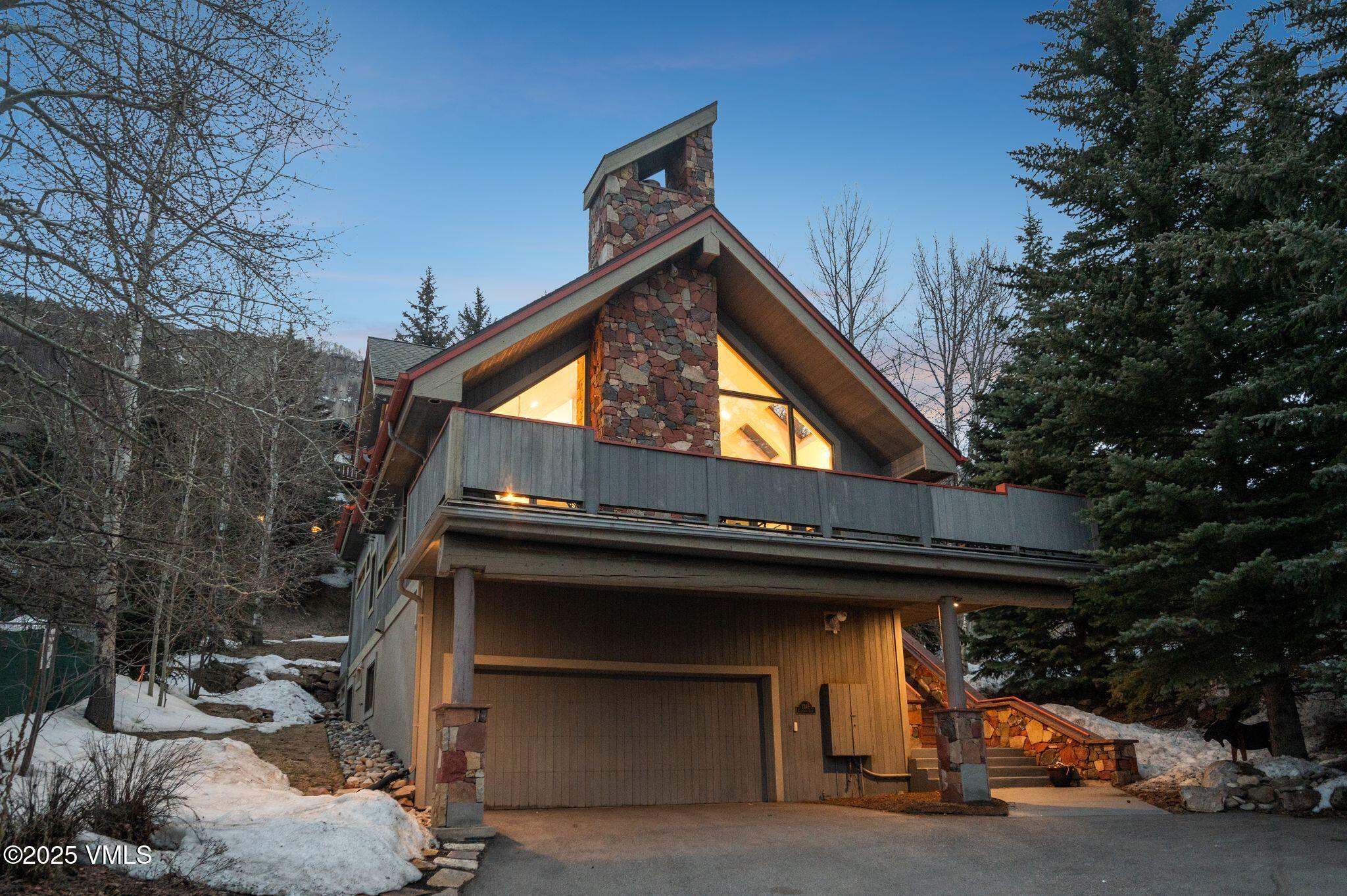 2349 Chamonix Lane Vail, CO 81657 - Photo 42 of 43 a view of house along with trees