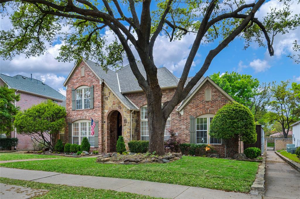 3529 Lakebrook Drive Plano, TX 75093 - Photo 1 of 1 a front view of a house with garden