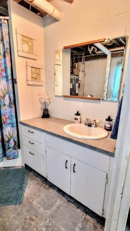 619 Copano Cove Road Rockport, TX 78382 - Photo 17 of 32 a bathroom with a sink and a mirror