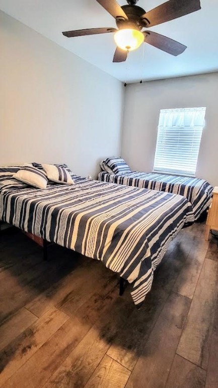 619 Copano Cove Road Rockport, TX 78382 - Photo 18 of 32 a view of a room with bed