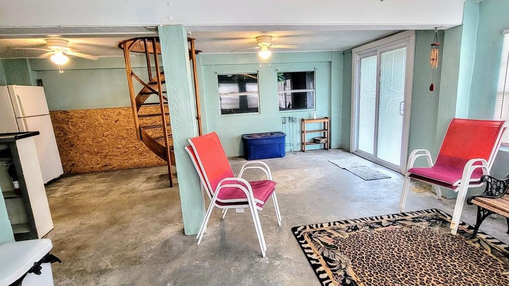 619 Copano Cove Road Rockport, TX 78382 - Photo 23 of 32 a workspace with furniture