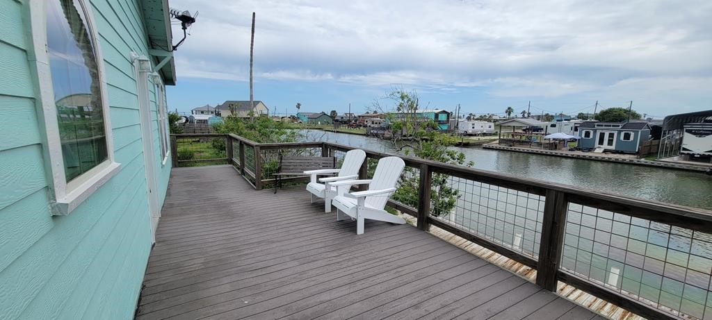619 Copano Cove Road Rockport, TX 78382 - Photo 31 of 32 a view of a balcony with chairs