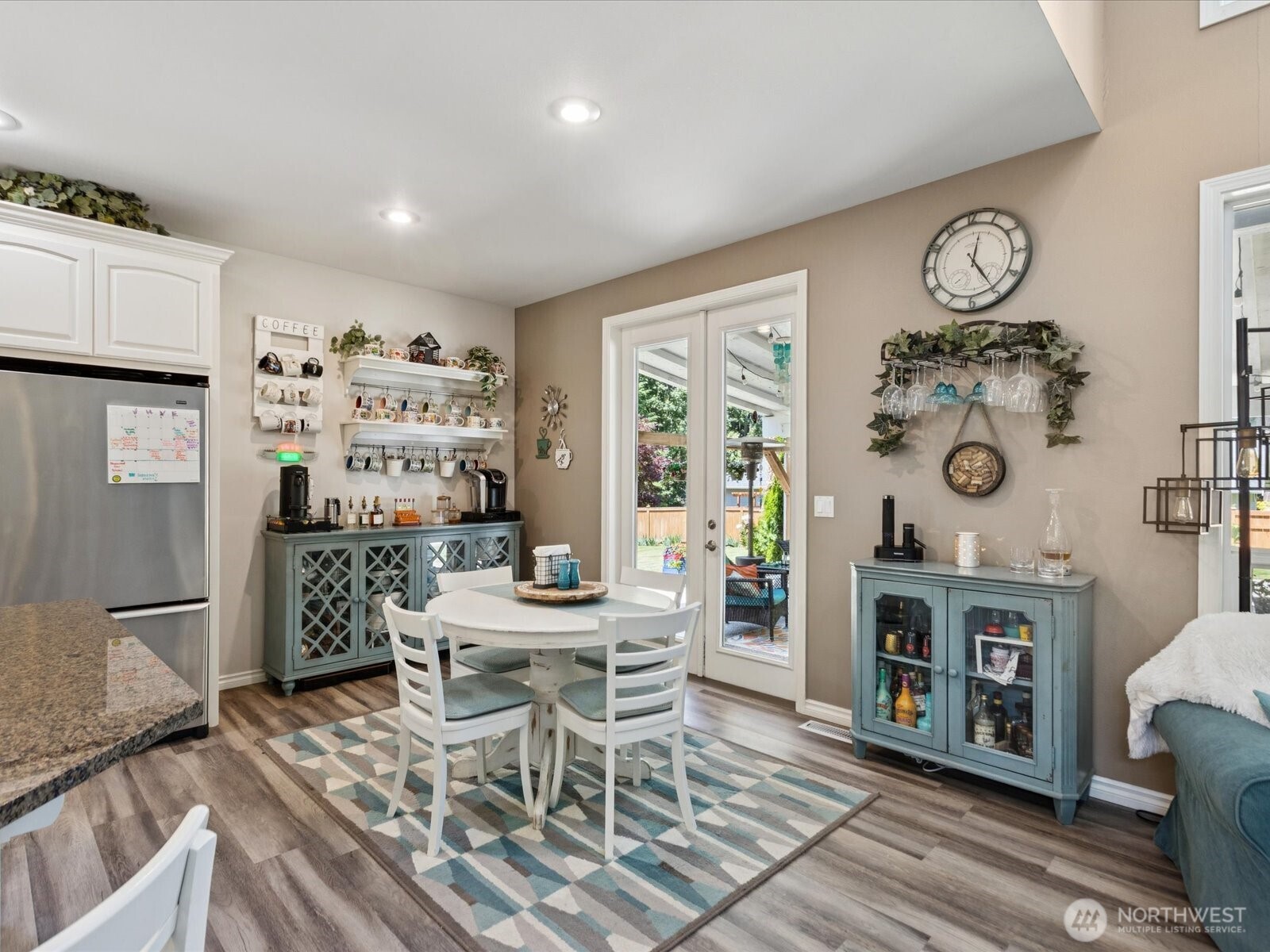 8817 Lakewood Road Stanwood, WA 98292 - Photo 12 of 40 a living room with furniture a clock and a clock