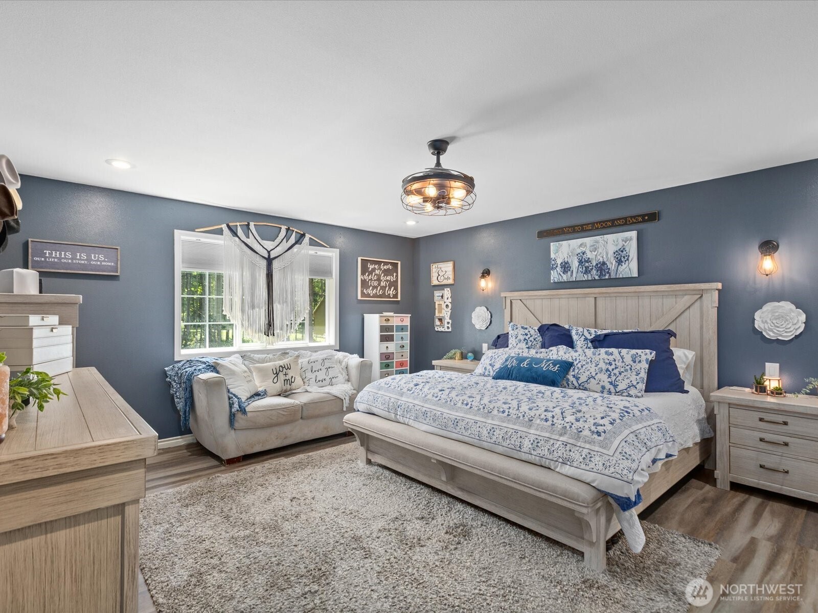 8817 Lakewood Road Stanwood, WA 98292 - Photo 24 of 40 a bedroom with a bed and a couch