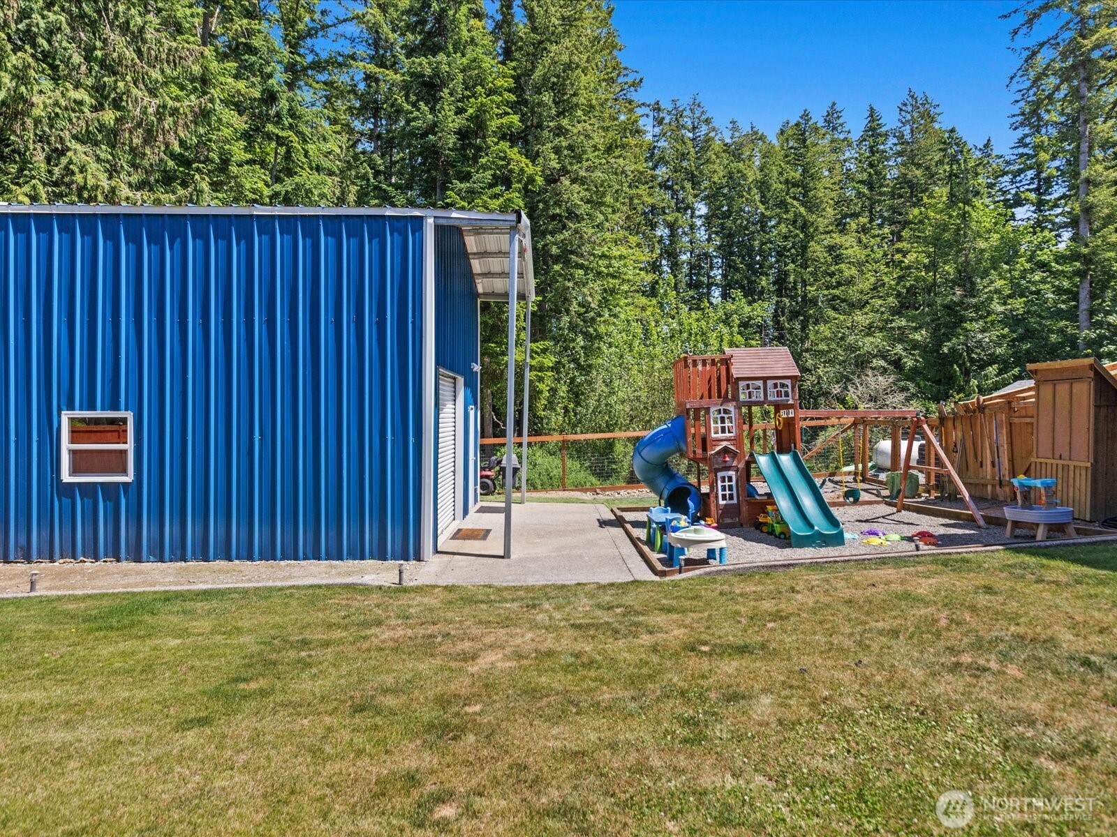 8817 Lakewood Road Stanwood, WA 98292 - Photo 38 of 40 a view of outdoor space with wooden fence and plants