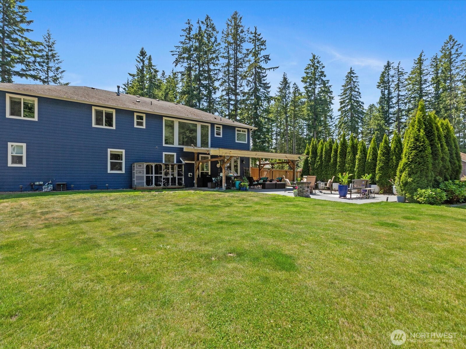 8817 Lakewood Road Stanwood, WA 98292 - Photo 39 of 40 a front view of a house with garden