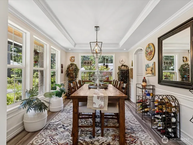 a view of a dining room with furniture window and outside view