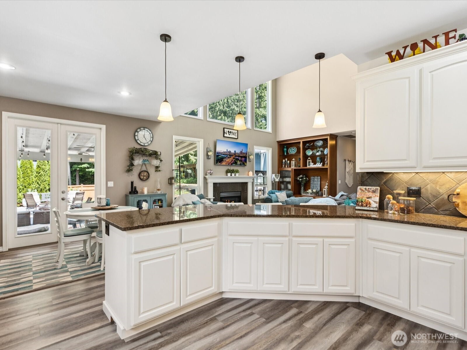 8817 Lakewood Road Stanwood, WA 98292 - Photo 8 of 40 a kitchen with white cabinets and sink