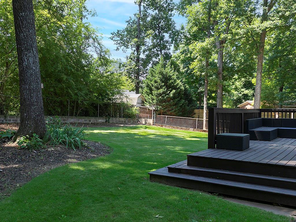 3249 Howell Drive Smyrna, GA 30080 - Photo 25 of 26 a view of a garden with wooden fence