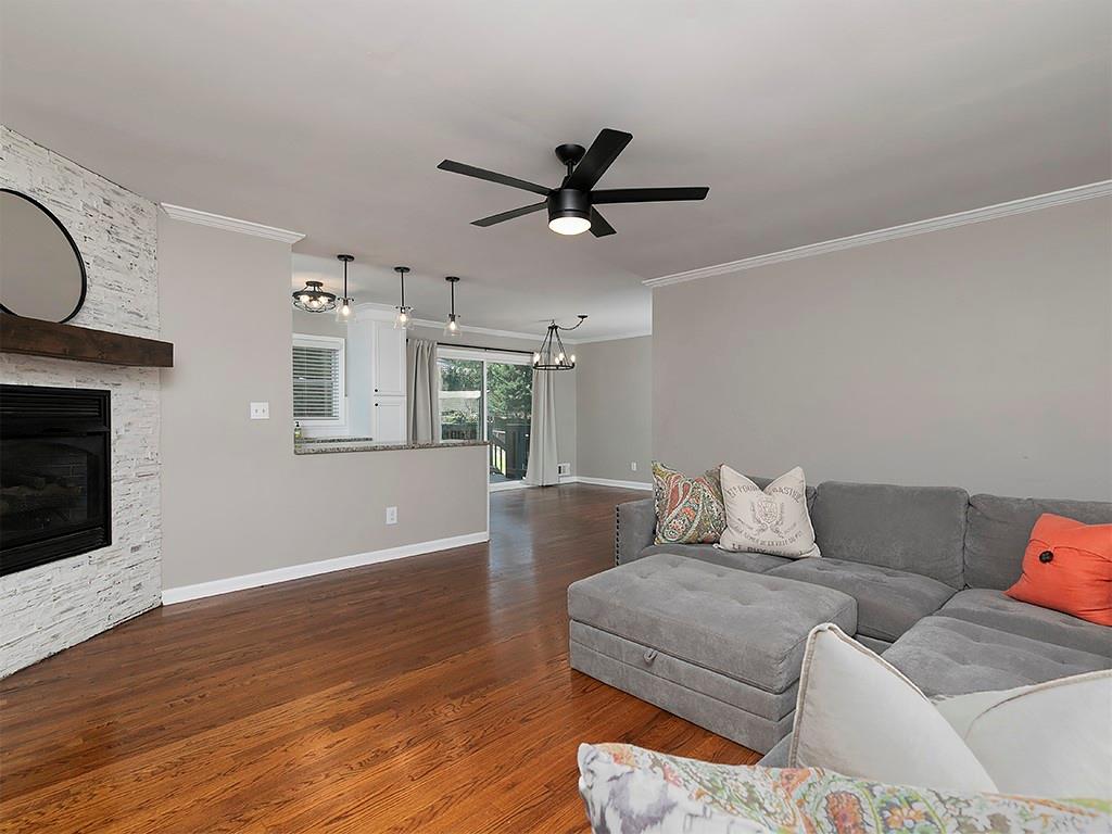 3249 Howell Drive Smyrna, GA 30080 - Photo 8 of 26 a living room with furniture and a fireplace