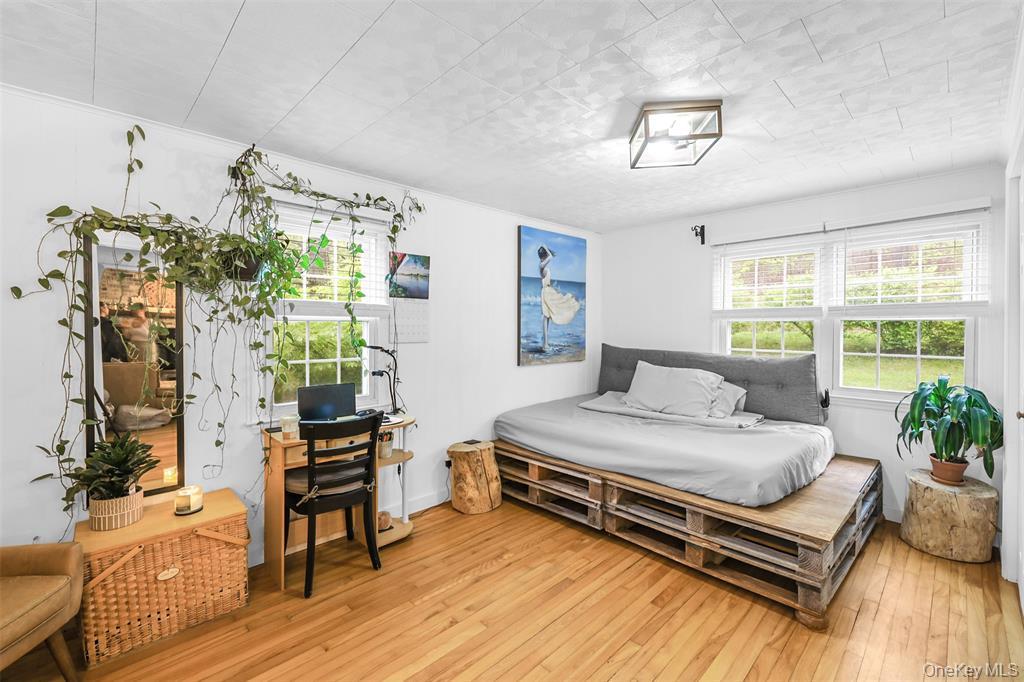 46 Quaker Hill Road Monroe, NY 10950 - Photo 19 of 33 Bedroom with light wood-style floors and multiple windows