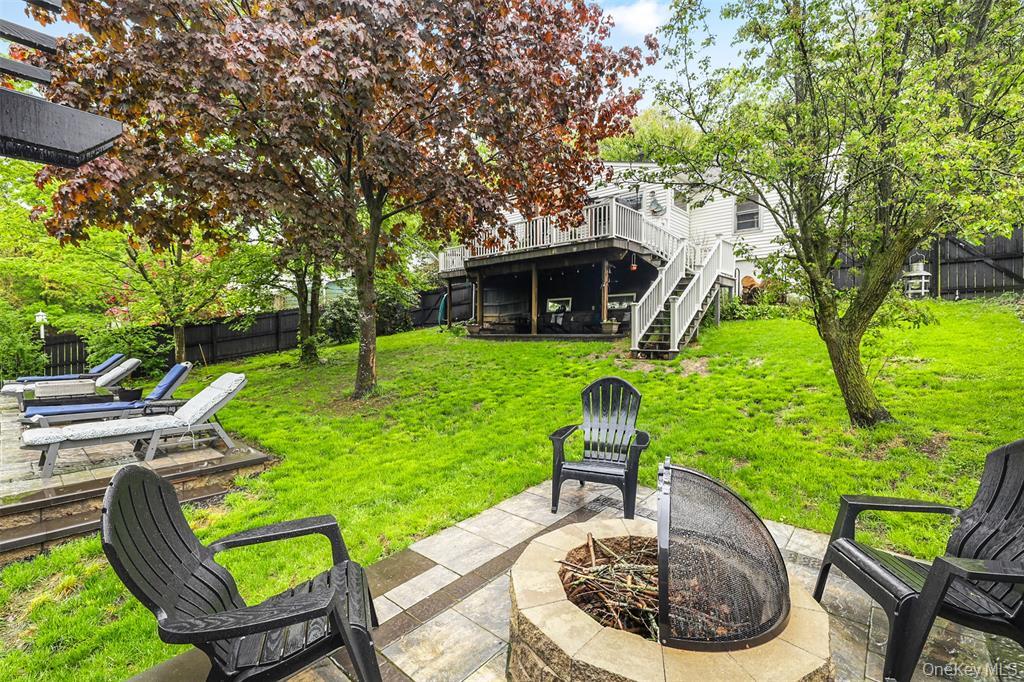 46 Quaker Hill Road Monroe, NY 10950 - Photo 6 of 33 View of yard featuring a fire pit, stairs, a wooden deck, and a patio