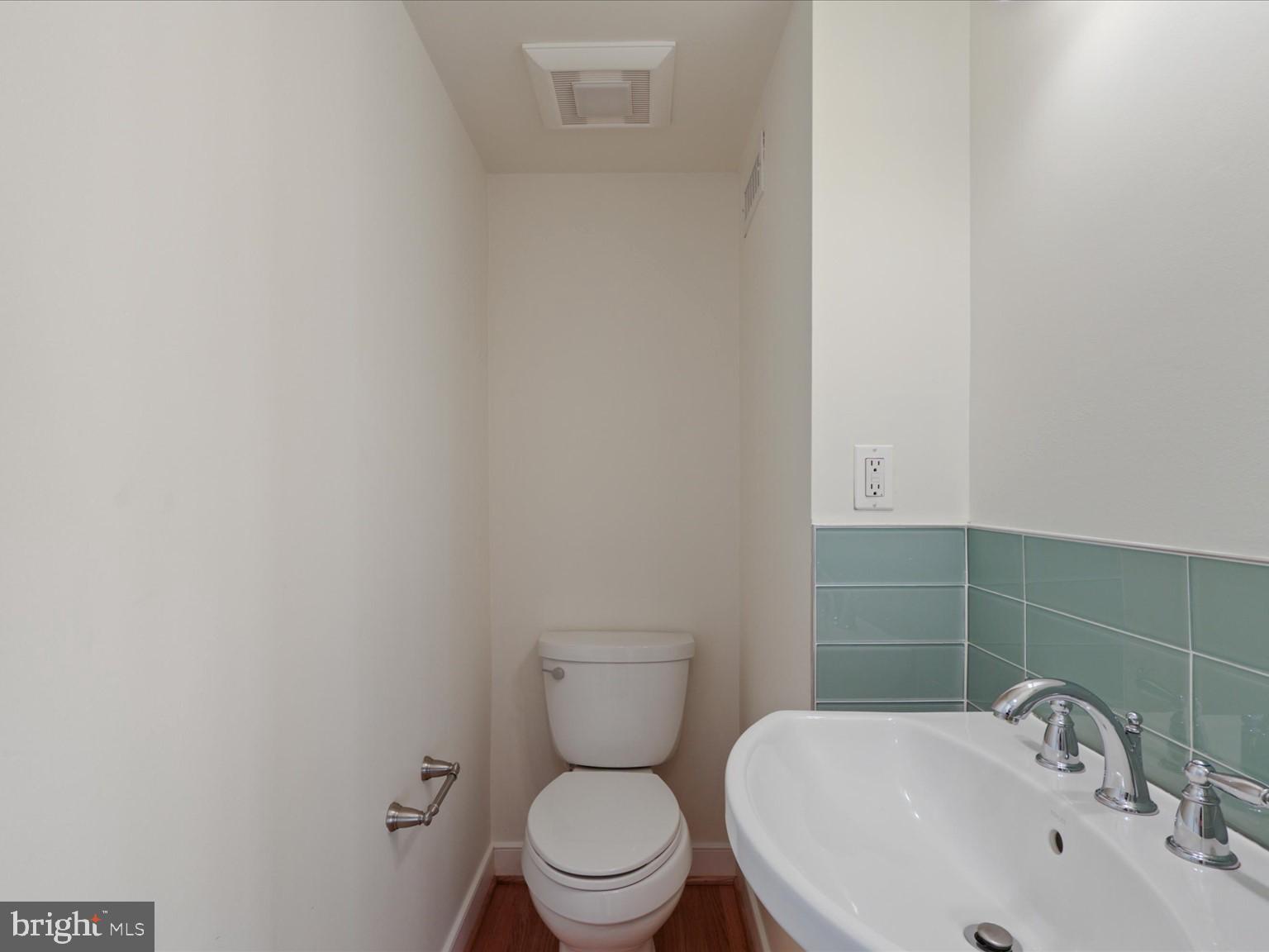 3604 Prospect Street Northwest Washington, DC 20007 - Photo 33 of 70 a bathroom with a toilet and sink