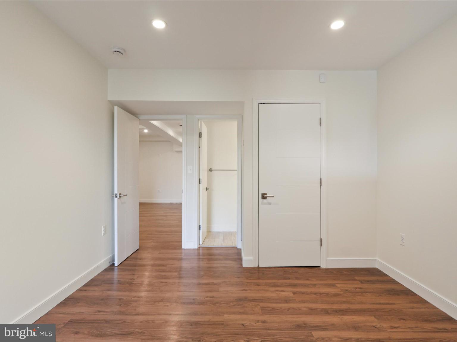 3604 Prospect Street Northwest Washington, DC 20007 - Photo 52 of 70 a view of a hallway with wooden floor