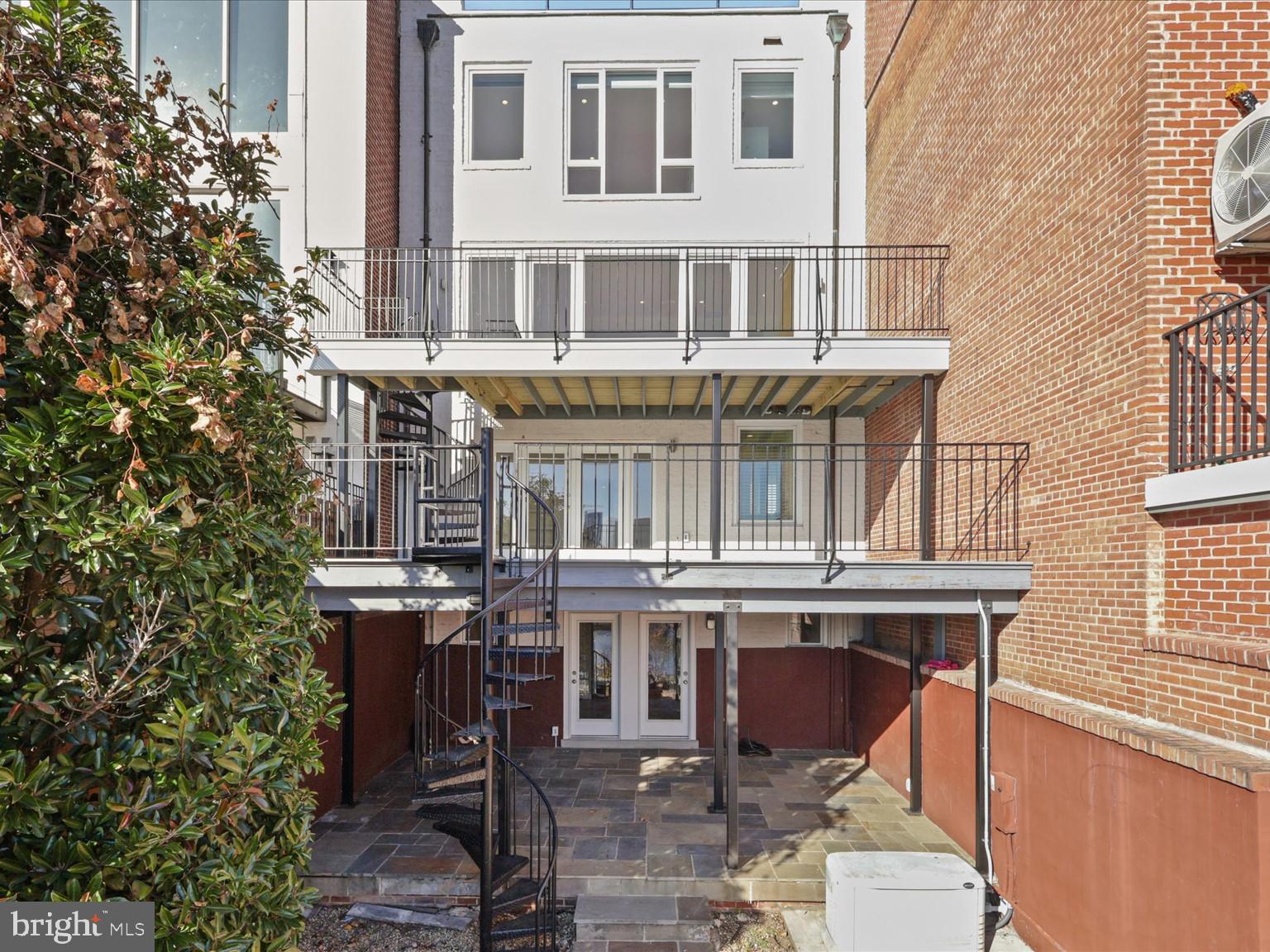 3604 Prospect Street Northwest Washington, DC 20007 - Photo 60 of 70 a view of a building with a window and balcony