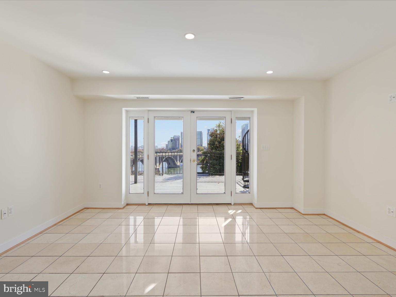 3604 Prospect Street Northwest Washington, DC 20007 - Photo 10 of 70 a view of an empty room with a window