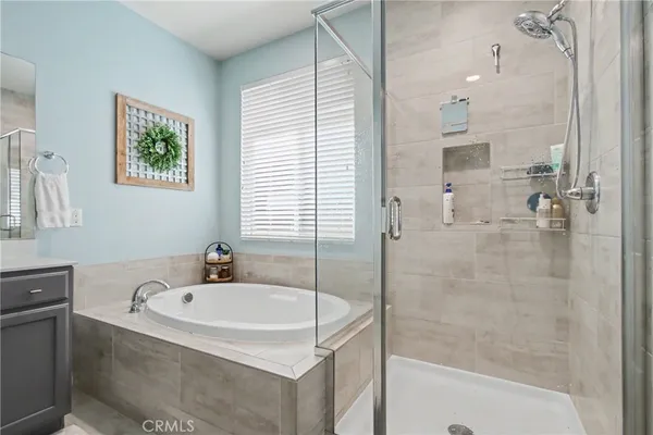 a bathroom with a bathtub and a sink