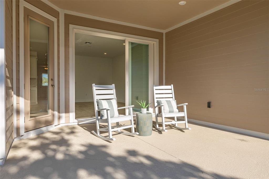 983 Fiesta Key Circle Lady Lake, FL 32159 - Photo 11 of 39 a view of a room with chairs and tables