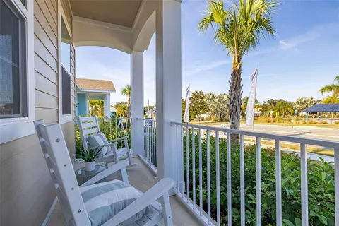 a view of balcony with furniture
