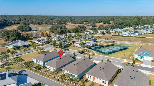 a view of a house with a swimming pool