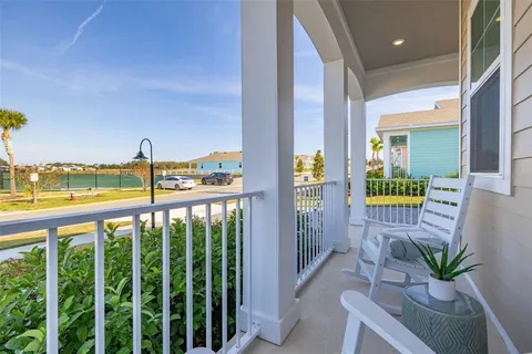 a view of balcony with furniture