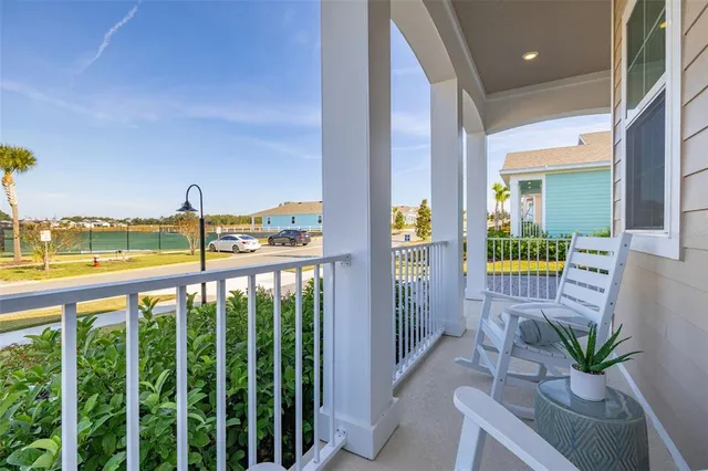 a view of balcony with furniture