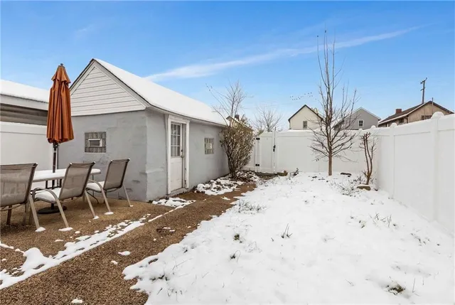 a view of a patio with a yard