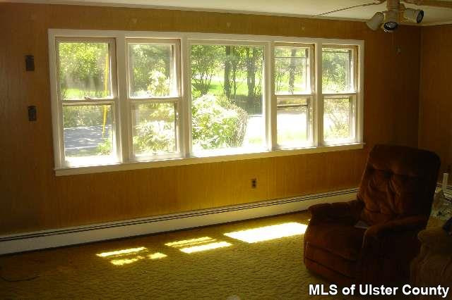4532 Atwood Road, Unit POSSIBLE UPDATING SOON Stone Ridge, NY 12484 - Photo 3 of 4 a view of an empty room with a window