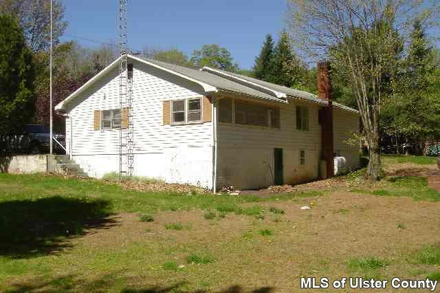 4532 Atwood Road, Unit POSSIBLE UPDATING SOON Stone Ridge, NY 12484 - Photo 4 of 4 a view of a house with backyard