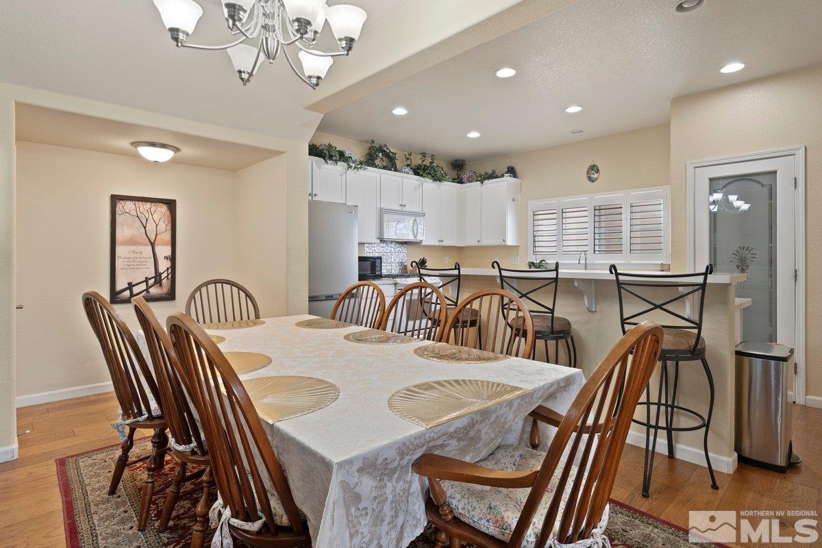 3240 Paragon Place Reno, NV 89509 - Photo 9 of 17 a view of a dining room with furniture