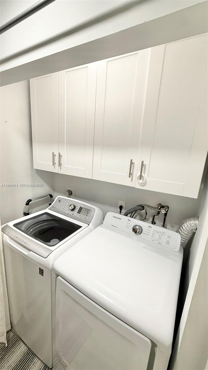6728 Boca Pines Trail, Unit B Boca Raton, FL 33433 - Photo 14 of 30 a utility room with dryer and washer