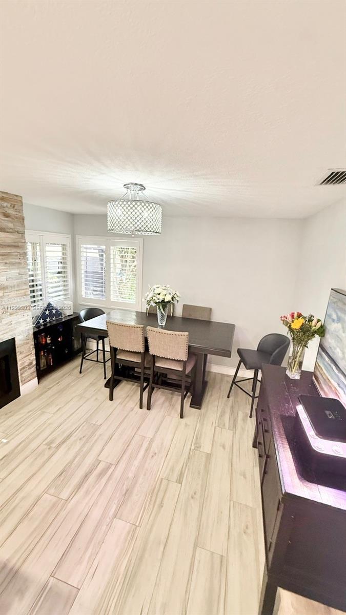 6728 Boca Pines Trail, Unit B Boca Raton, FL 33433 - Photo 8 of 30 a living room with furniture and a wooden floor