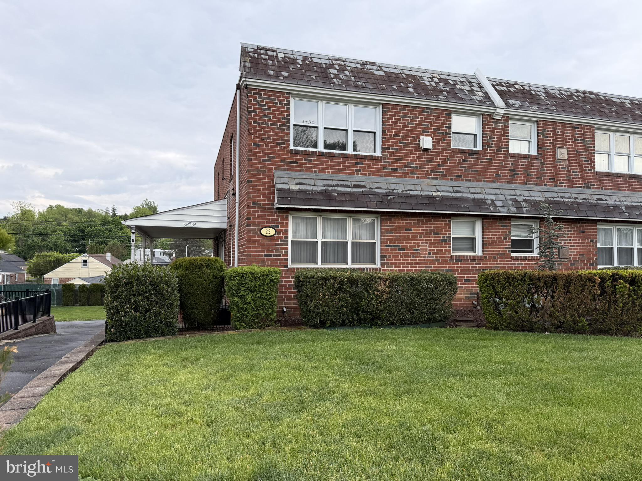 22 Windsor Road, Unit 2 Glenside, PA 19038 - Photo 2 of 29 Charming brick duplex with lush lawn.