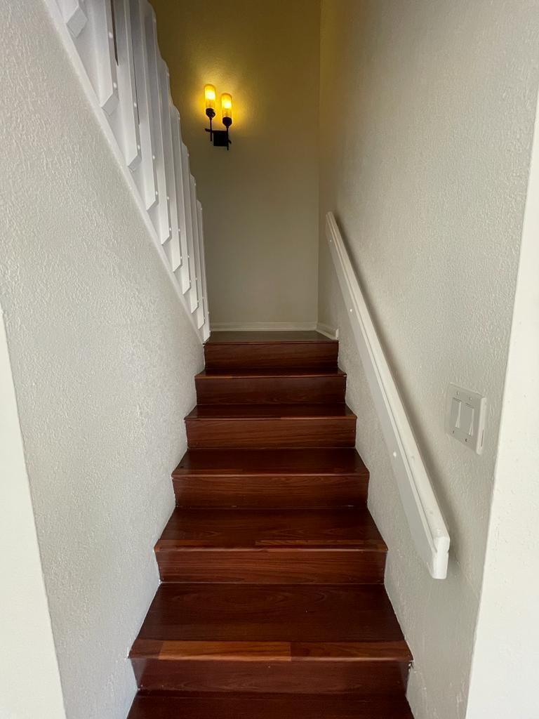 8243 Thames Boulevard, Unit D Boca Raton, FL 33433 - Photo 13 of 23 Wood staircase