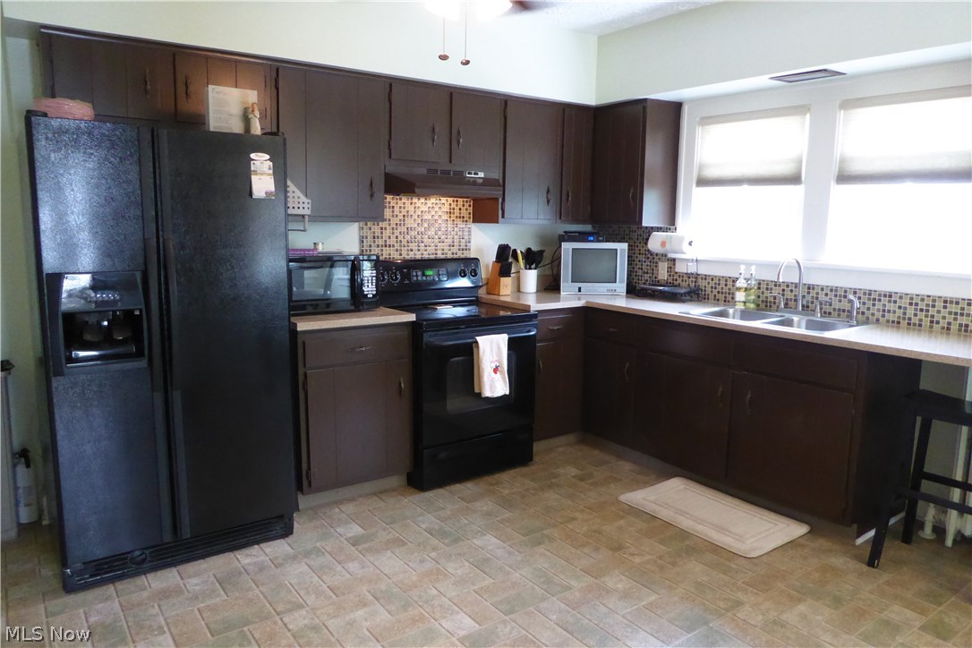 496 Babbitt Road Euclid, OH 44123 - Photo 10 of 31 Plenty of Cabinets, Decorative Backsplash, Newer Flooring - A Cook's Delight!