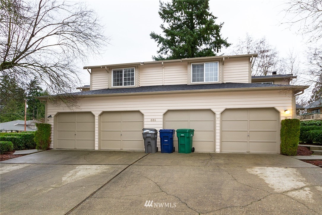531 Duchess Road Bothell, WA 98012 - Photo 1 of 25 a front view of a house with a garage