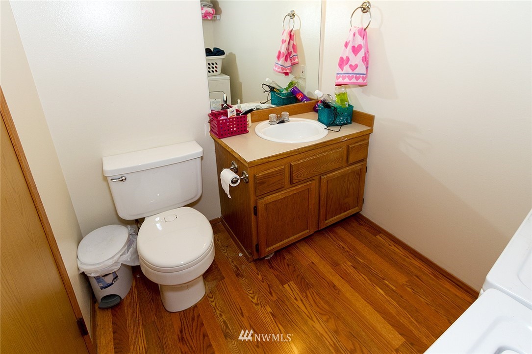 531 Duchess Road Bothell, WA 98012 - Photo 10 of 25 a bathroom with a sink toilet and vanity