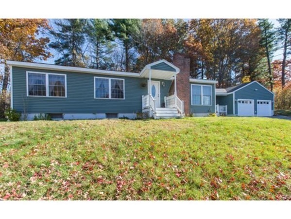 3 McLain Drive Pelham, NH 03076 - Photo 28 of 34 a front view of a house with garden