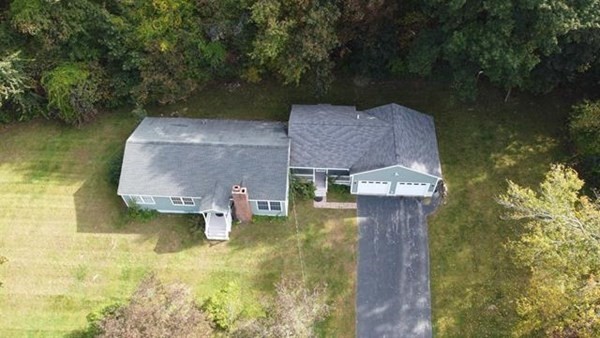 3 McLain Drive Pelham, NH 03076 - Photo 31 of 34 an aerial view of a house with swimming pool and a yard