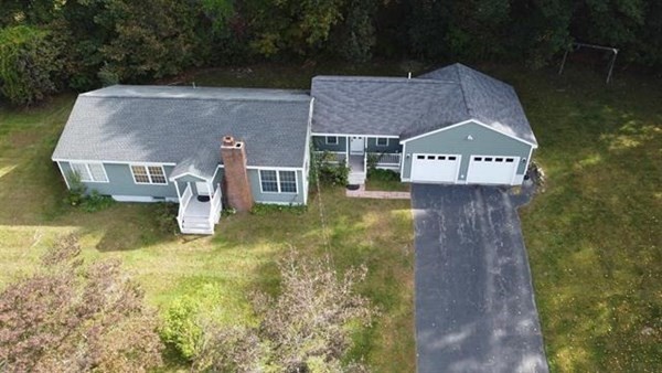 3 McLain Drive Pelham, NH 03076 - Photo 33 of 34 an aerial view of a house with a yard