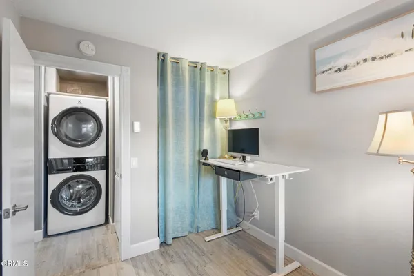 a view of livingroom with washer and dryer