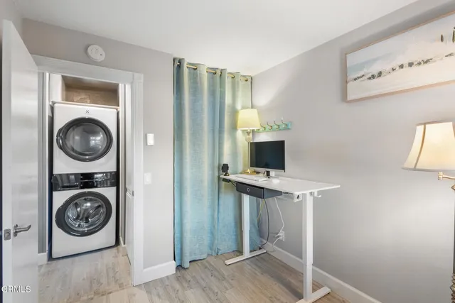 a view of livingroom with washer and dryer