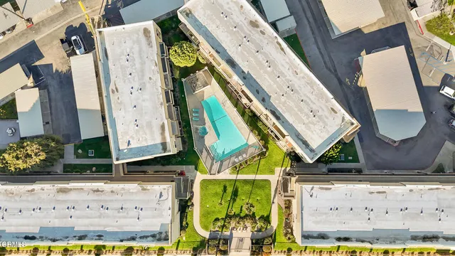 a view of an entryway with a sign broad