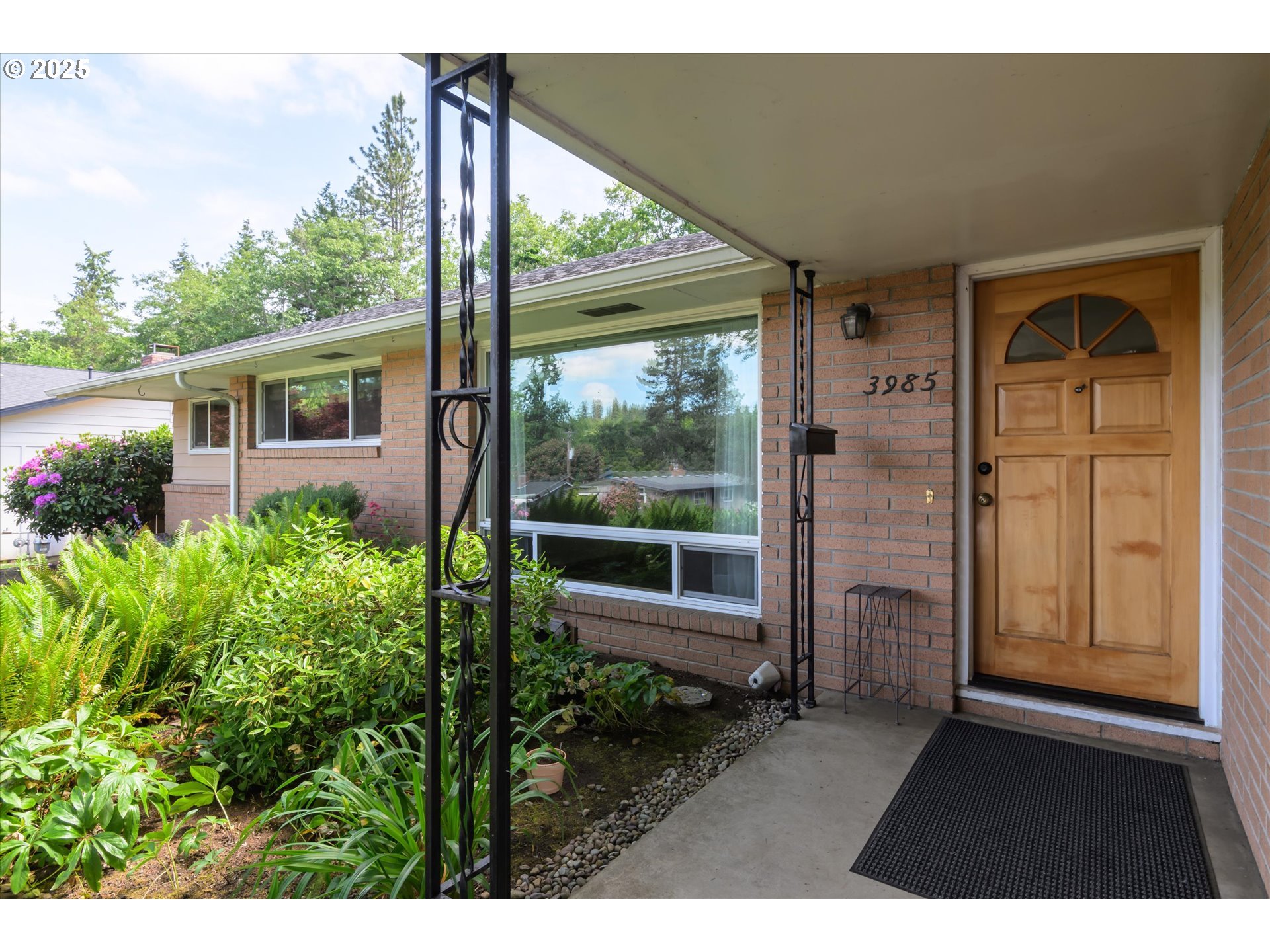 3985 Donald Street Eugene, OR 97405 - Photo 7 of 39 a view of backyard with garden and plants