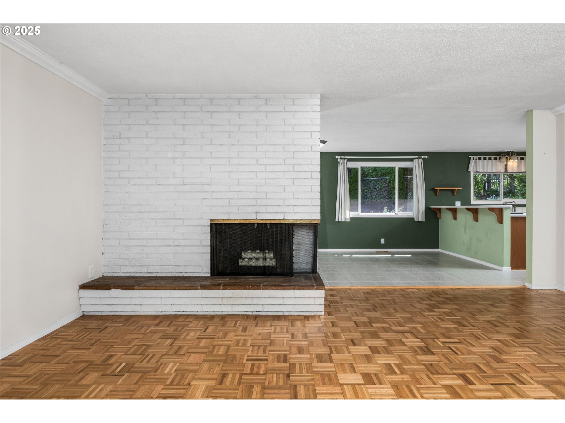 3985 Donald Street Eugene, OR 97405 - Photo 10 of 39 a view of empty room with a fireplace