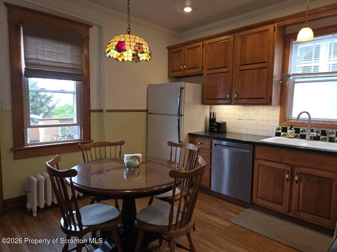 229 East Mountain Road Scranton, PA 18505 - Photo 22 of 47 a kitchen with a dining table chairs and granite counter tops