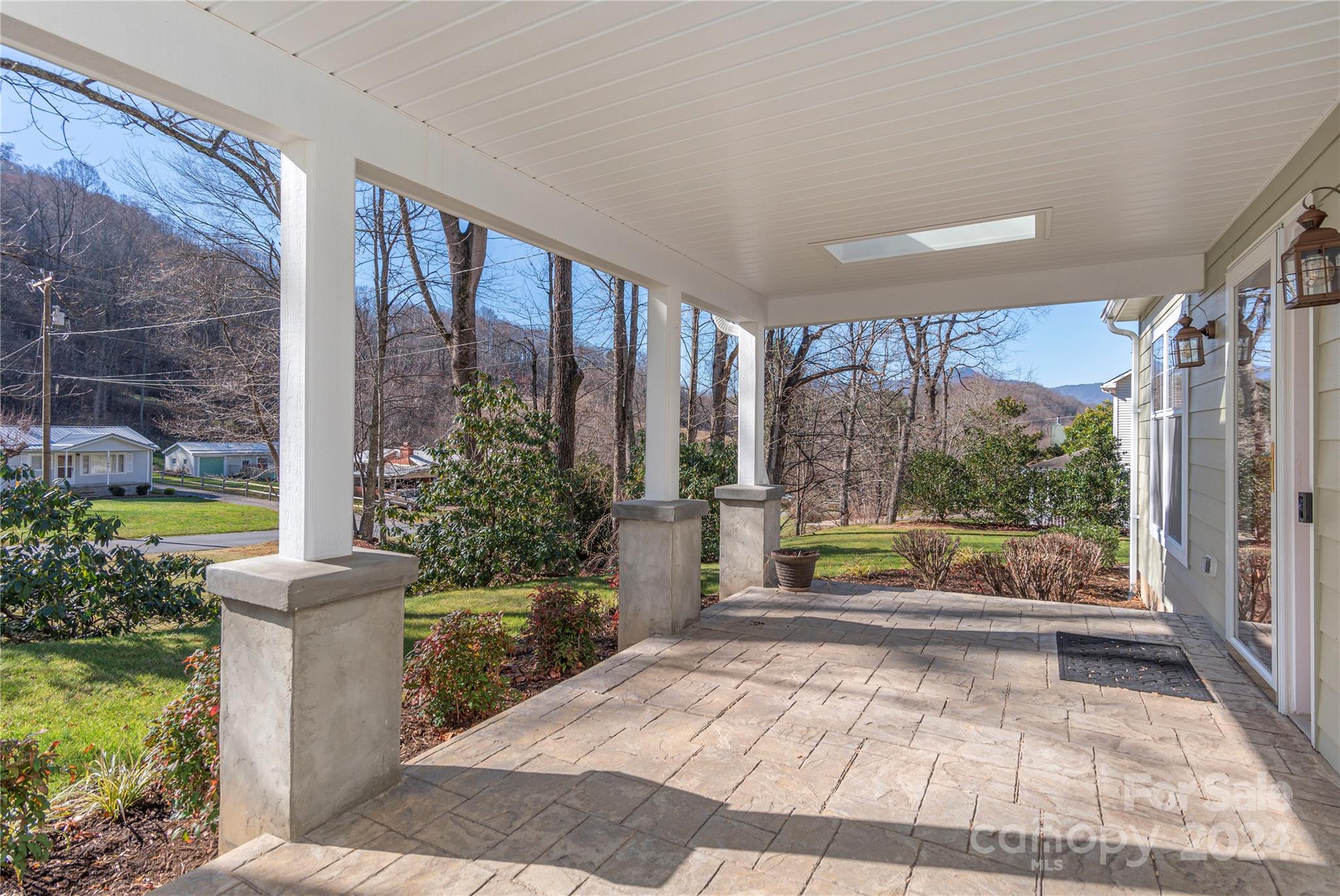 1201 Camp Branch Road Waynesville, NC 28786 - Photo 8 of 26 a garden view with a seating space