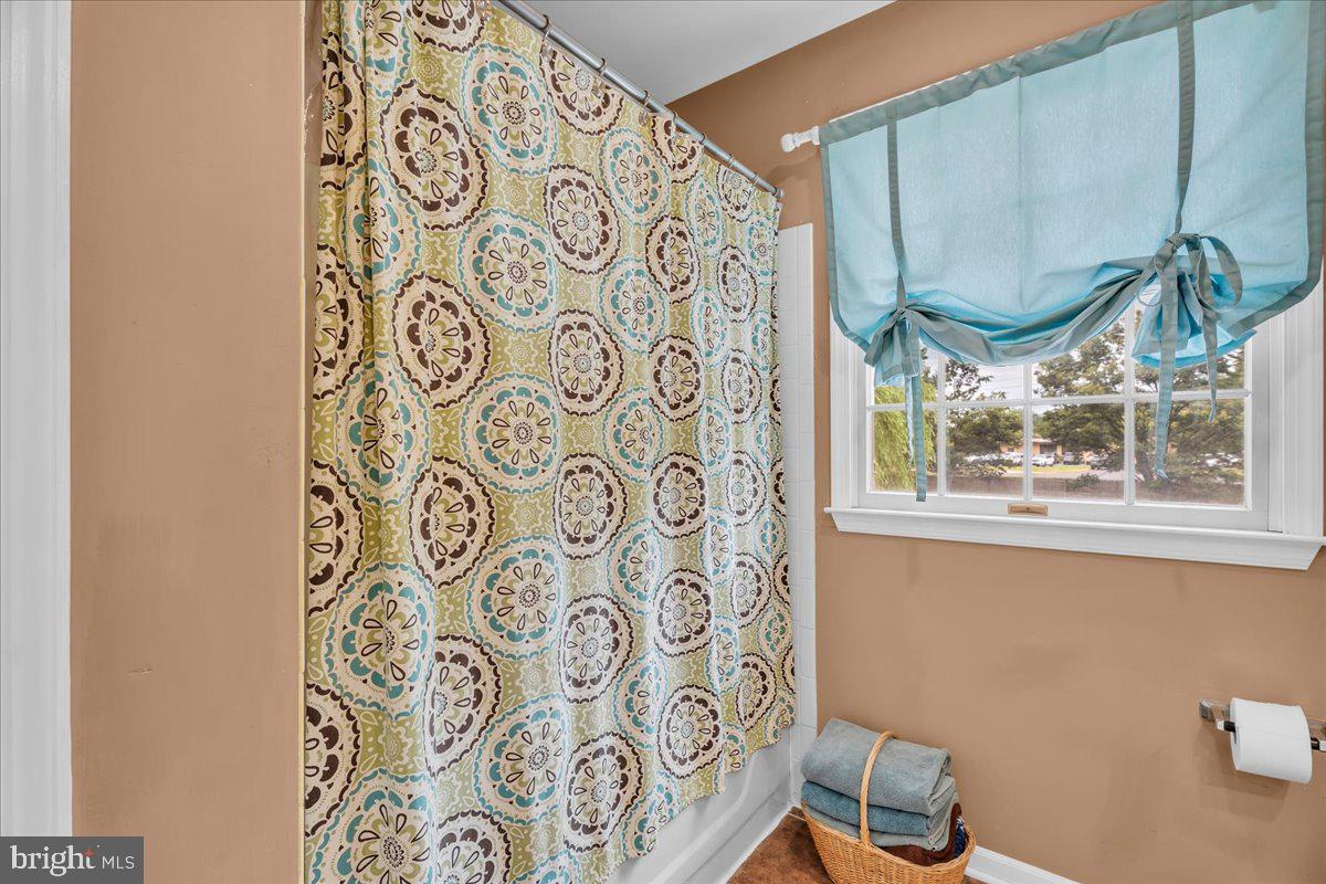 27 Spring Mill Drive Sewell, NJ 08080 - Photo 16 of 34 Charming bathroom with vibrant decor.